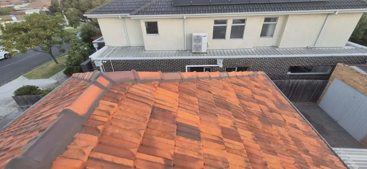 Frankston concrete tile roof after restoration - vibrant colour restored with 10-year warranty coating
