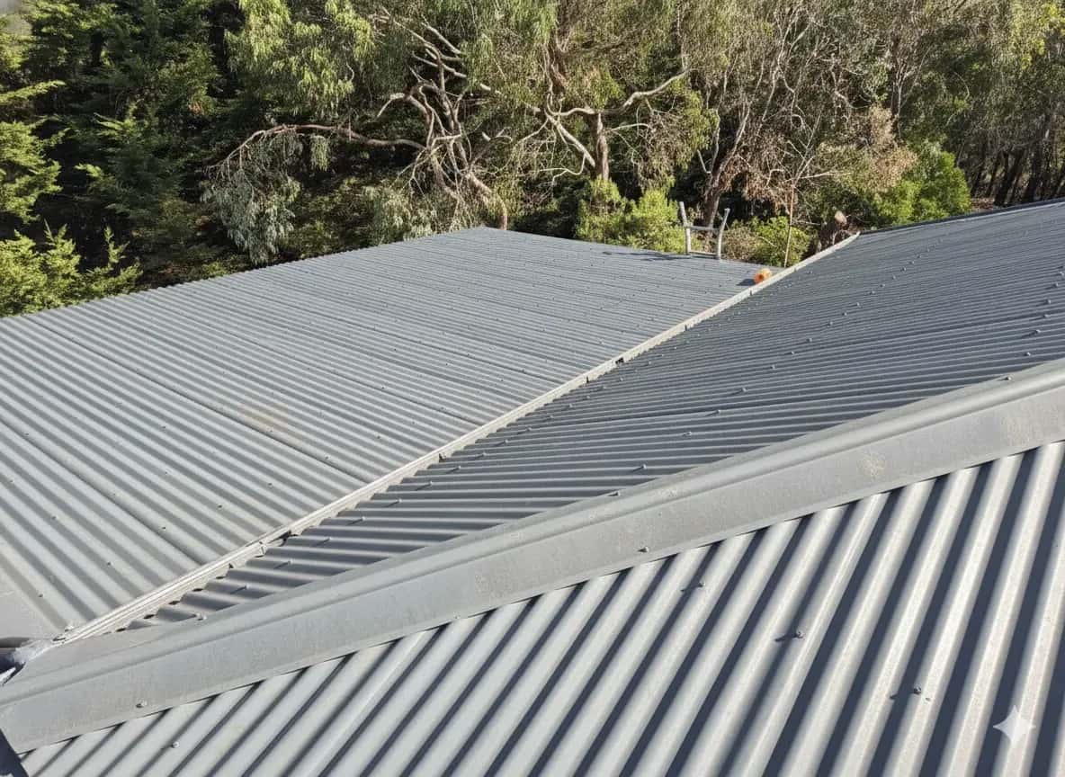Dandenong roof before restoration - faded concrete tiles with moss growth and deteriorated pointing