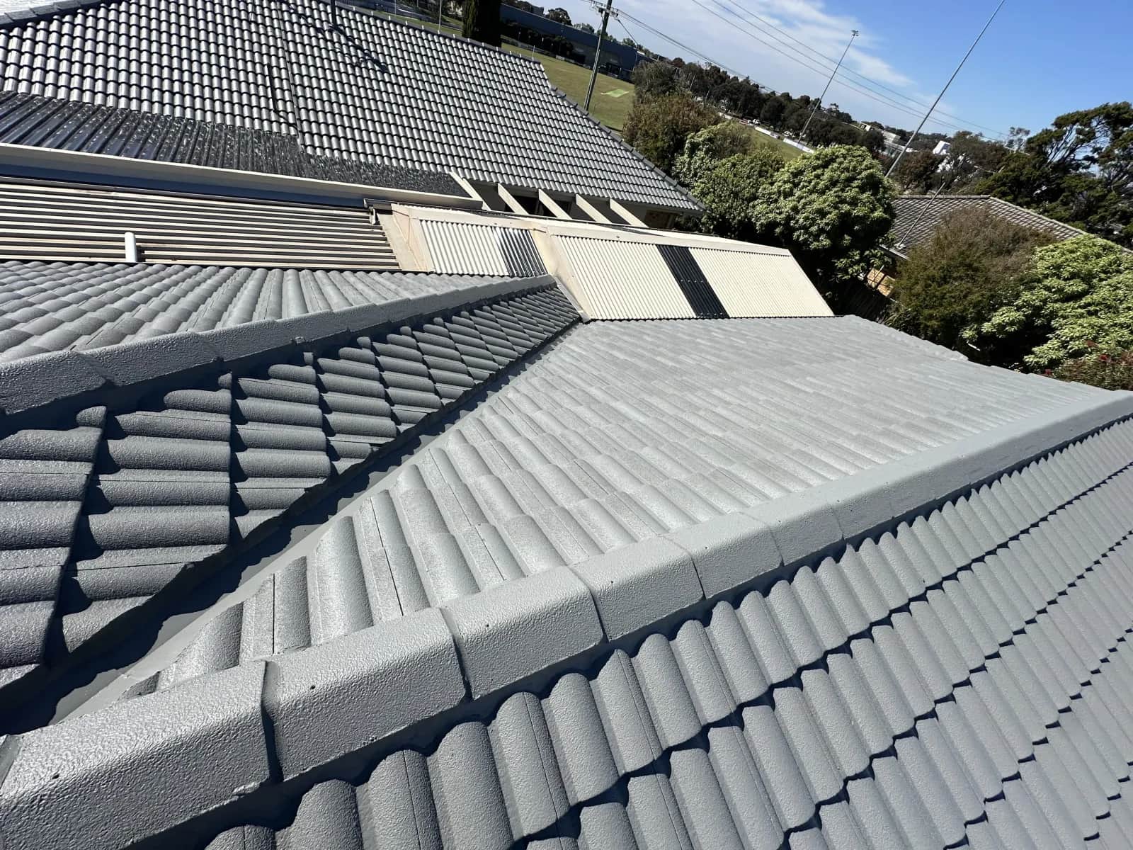 Completed roof restoration on a Frankston home — fresh protective membrane coating applied by professionals