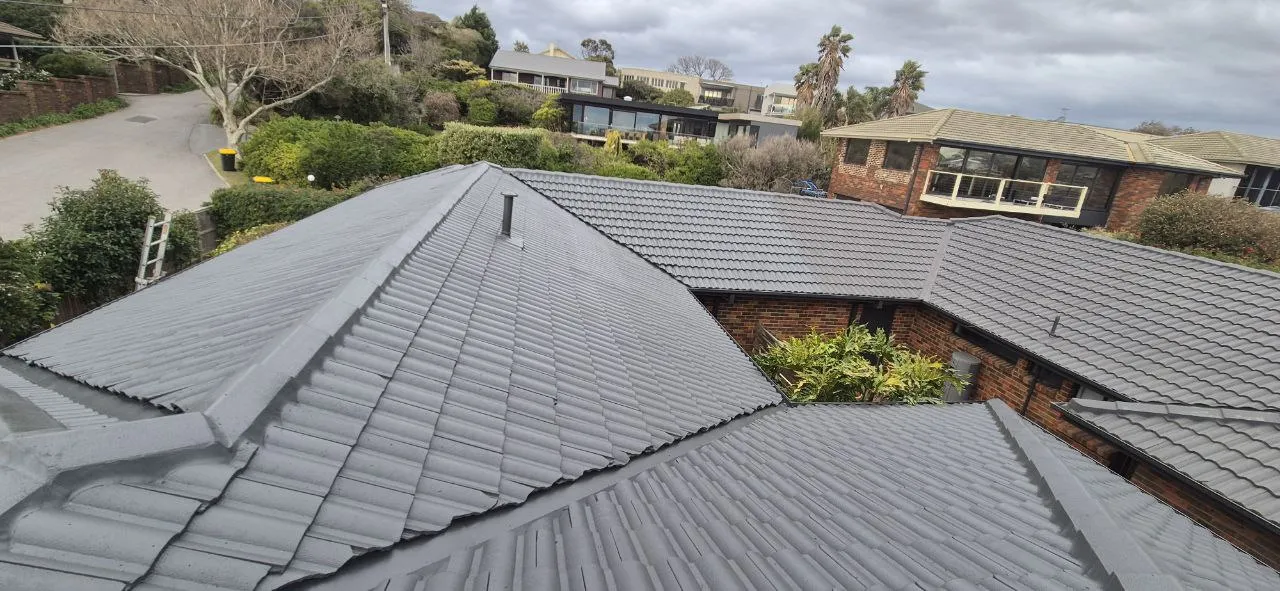 Frankston Peninsula Roofing team at work - licensed professionals restoring coastal home roof